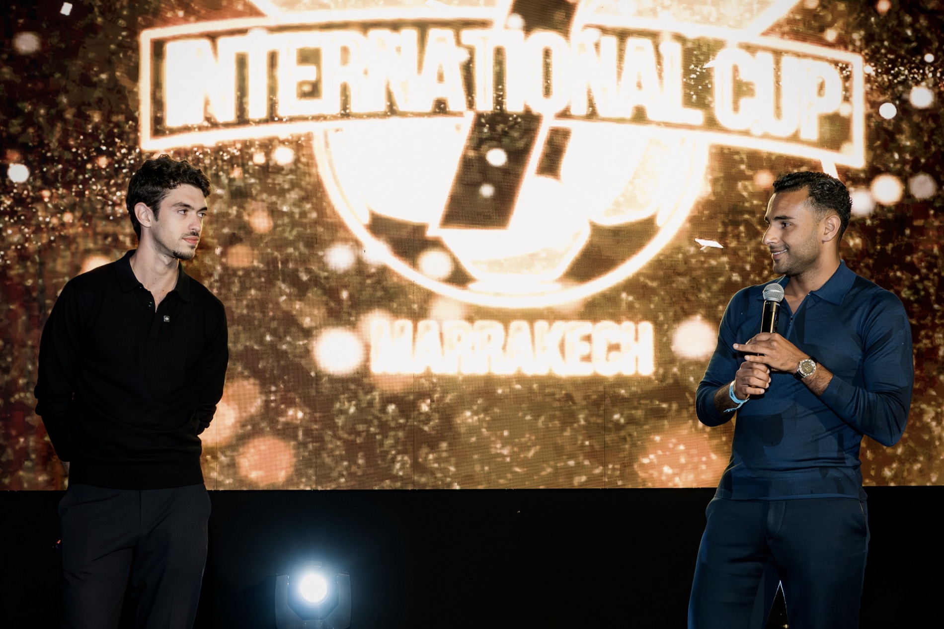 Adam and Soleiman, Road2Soccer co-founders, on stage at the Marrakech Showcase